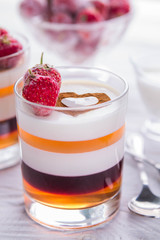 Layered jelly dessert with strawberries