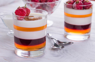 Layered jelly dessert with strawberries