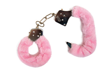 pink sexy fluffy handcuffs isolated