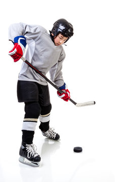 Junior Ice Hockey Player Isolated on White Background