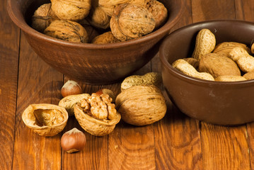 Image of ripe walnuts on the table close-up