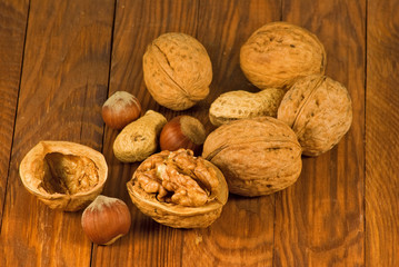 Image of ripe walnuts on the table close-up