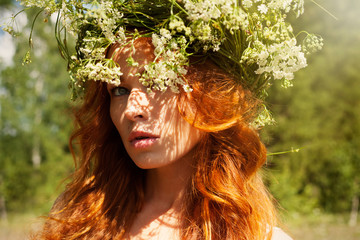 Portrait of beautiful woman with long healthy hair outdoor. Summ