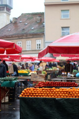 Oranges on display at Dolac Market in Zagreb, Croatia. Selective focus.