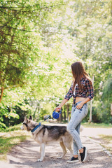 young beautiful girl walking park