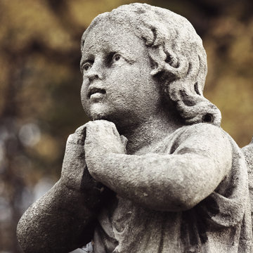 Figure Of A Praying Angel
