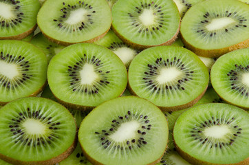 Background of green slices kiwi 