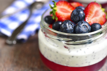 Dessert with chia seed pudding,strawberry jelly and fresh berrie