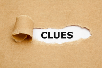 Clues Ripped Paper Concept