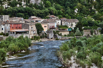 Fototapeta na wymiar The town of Vogue on the River Ardeche in France.