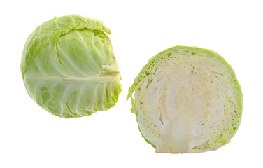 Organic cabbage halves on a white background.