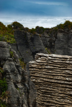 Eroded limestone rocks at Dolomite Point on the west coast of the South Island of New Zealand.  Known as 'Pancake Rocks' due to their layered appearance.