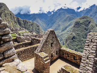 Machu Picchu Peru ancient inca stone ruin civilization houses on a hill landscape