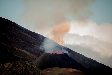 Ile de la reunion island Piton de la fournaise volcano eruption with lava flow and steam © Bjoern