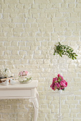 decorative wedding table and brick wall concept