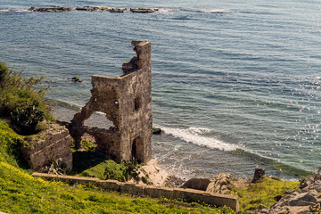 Housing in ruins in the Strait of Gibraltar. Tarifa, Spain. © Juanamari Gonzalez