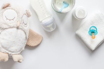 preparation of mixture baby feeding on white background top view