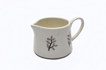 Glass with milk on white background