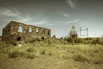 Michigan Ghost Town. Abandoned buildings at the Quincy copper Mine in Michigan's Upper Peninsula. This is a site of the United States Keweenaw National Historic Park in Calumet, Michigan.
