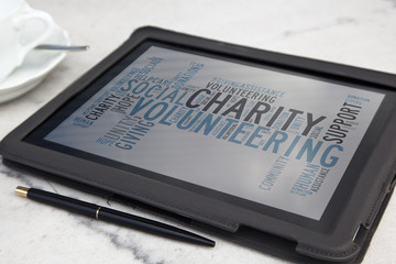 tablet with charity word cloud