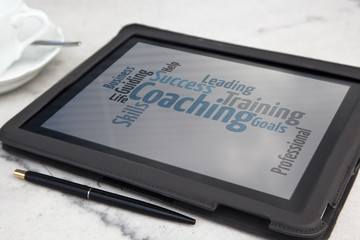 tablet with personal coaching word cloud