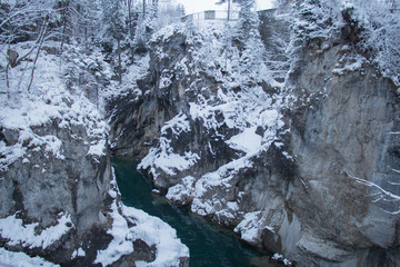 Fototapeta na wymiar Gorge on the Lech river in winter time. Fussen. Germany.