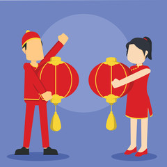 chinese man and women holding huge chinese lantern