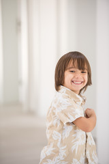 Cute school kid posing in studio with different facial expressio