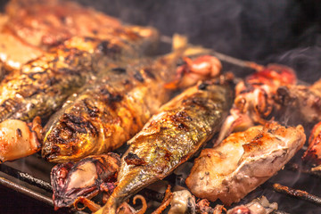 beside the street a small restaurant bbq sea food and pork for sale to tourist