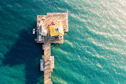 Aerial view of an ocean pier - Powered by Adobe