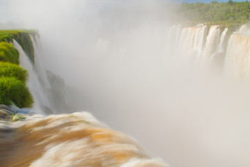 Iguazu (Iguacu) falls, largest series of waterfalls on the planet, located between Brazil, Argentina, and Paraguay with up to 275 separate waterfalls cascading along 2,700 meters (1.6 miles) cliffs.