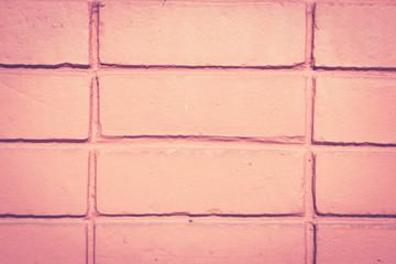 Background of orange brick wall. Retro vintage filter effect.