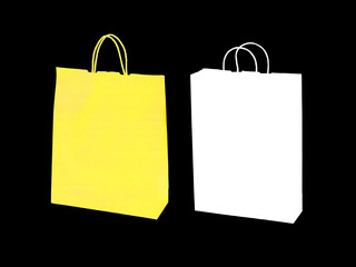 White and yellow shopping bags isolated on black background.
