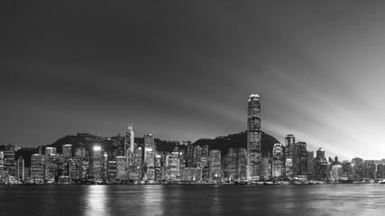 Panorama of Victoria Harbor in Hong Kong city at dusk