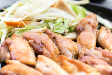 chicken steak on iron hot plate