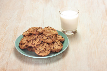 Chocolate chips cookies with milk and copyspace