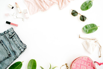 Frame of trendy feminine clothes and accessories. Flat lay, top view