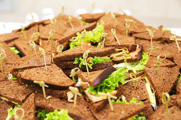 delicious catering food set with sandwiches