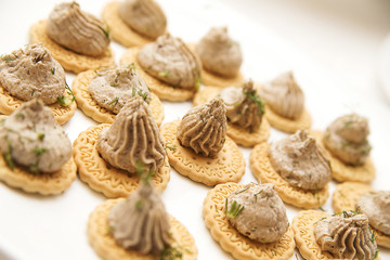 crackers with  pate and parsley