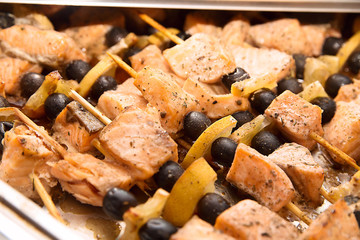 Grilled skewers of salmon. Close up