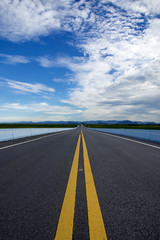 Empty road and the yellow traffic lines