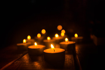 Golden light of candle flame.