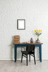 old table and brick wall concept interior
