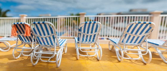 Lounge chairs on a sun deck