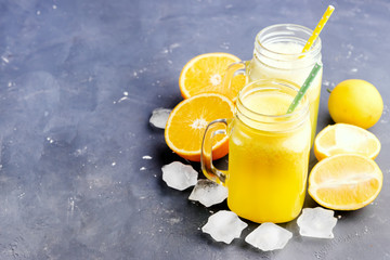Fresh citrus juice in jars