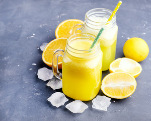 Fresh citrus juice in jars