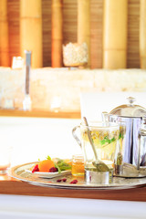 Chamomile tea with teapot near jacuzzi. Valentines background. R