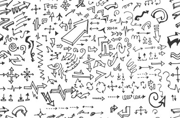 Fototapeta na wymiar hand-drawn doodle seamless pattern with arrows