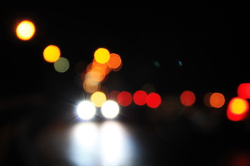 Bokeh blurred car lights at the night