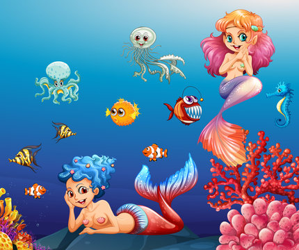 Two beautiful mermaids and sea animals underwater
